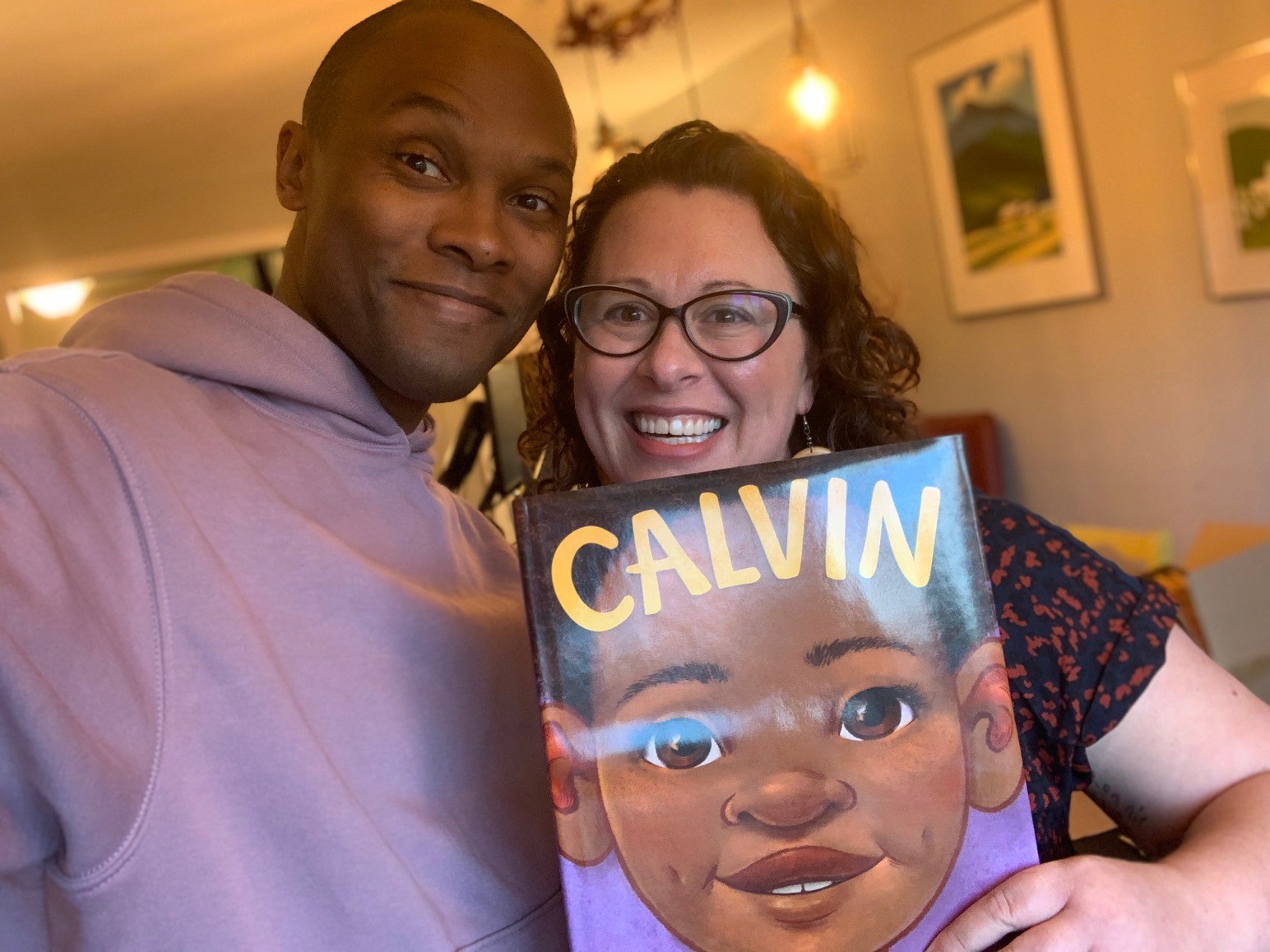 JR and Vanessa Ford with their book, Calvin.